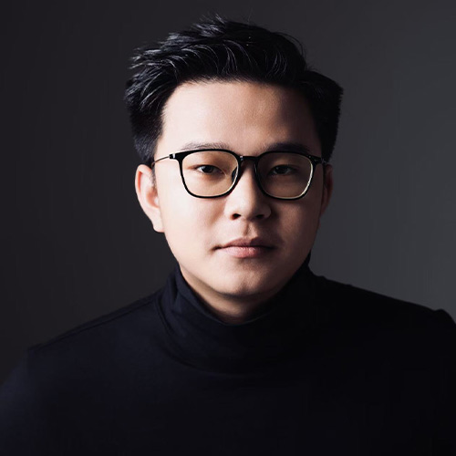 龍業成